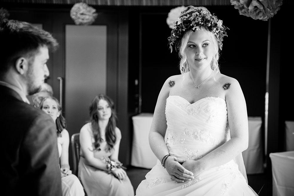 Bride looking at the registrar during the ceremony