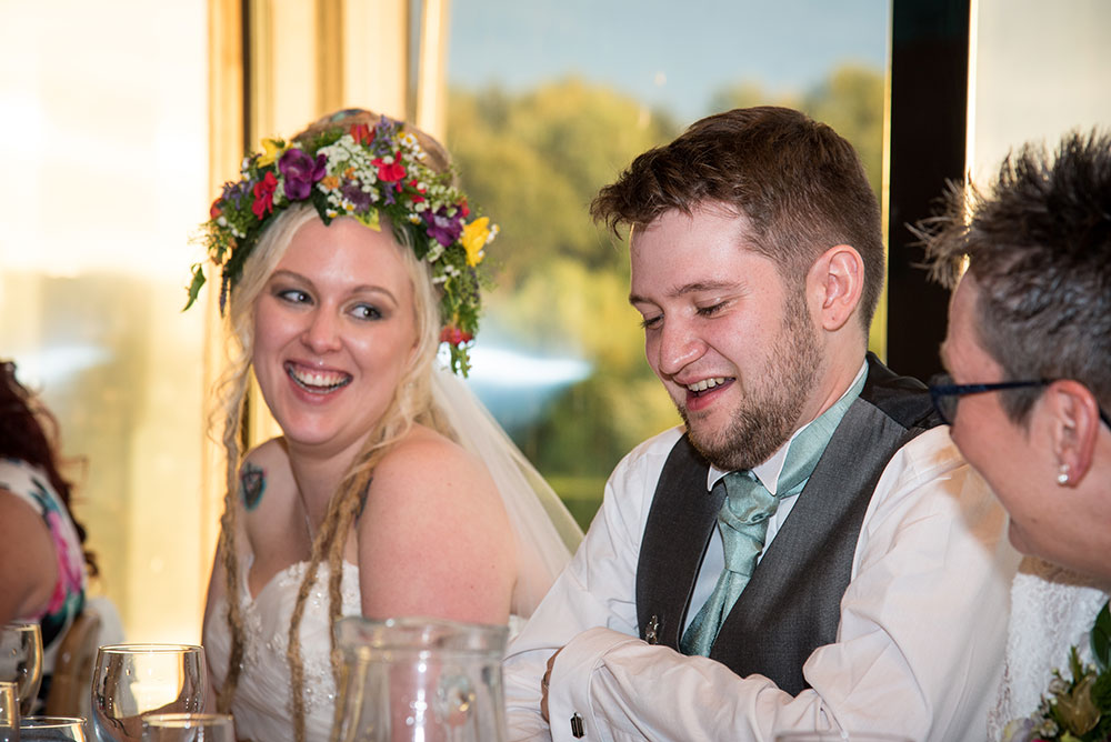 Bride looking at groom during speeches