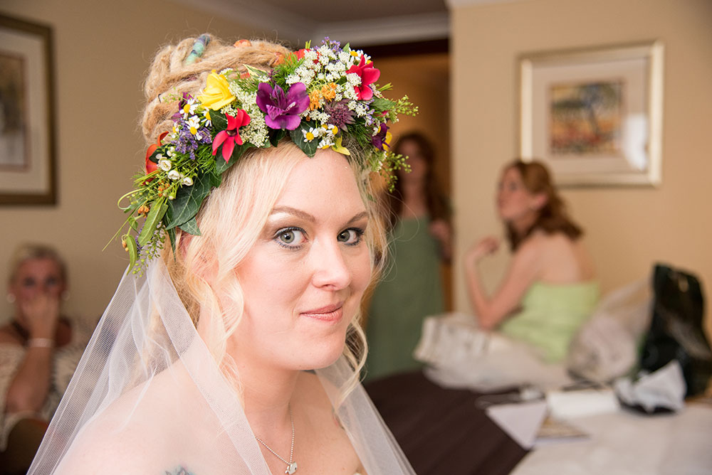 Bride pulling faces after getting ready
