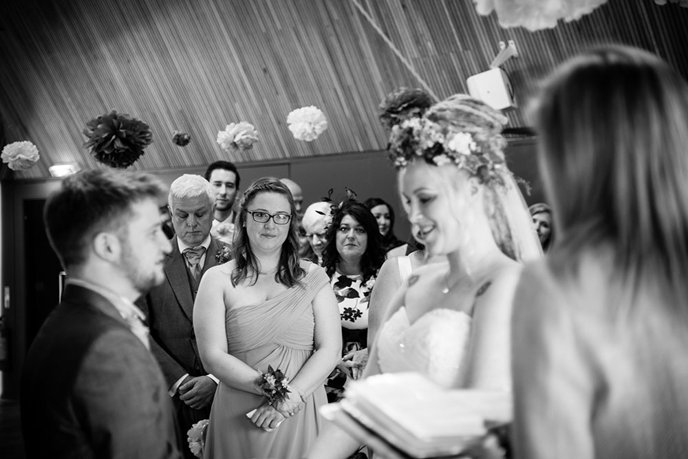 Bridesmaid watching the ceremony