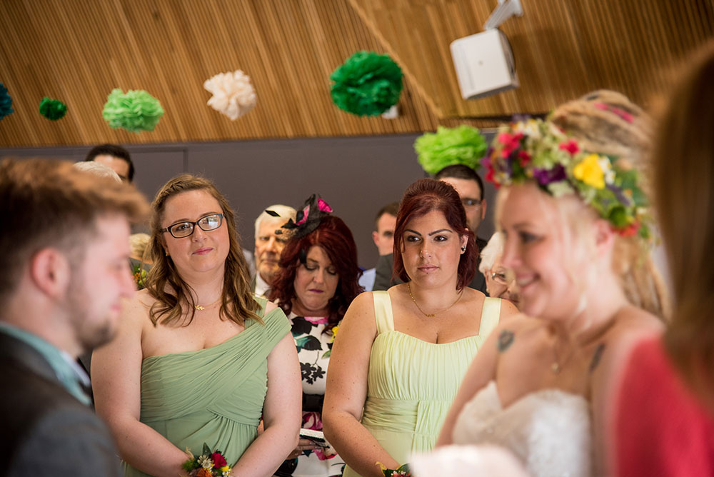 Bridesmaids watching the ceremony