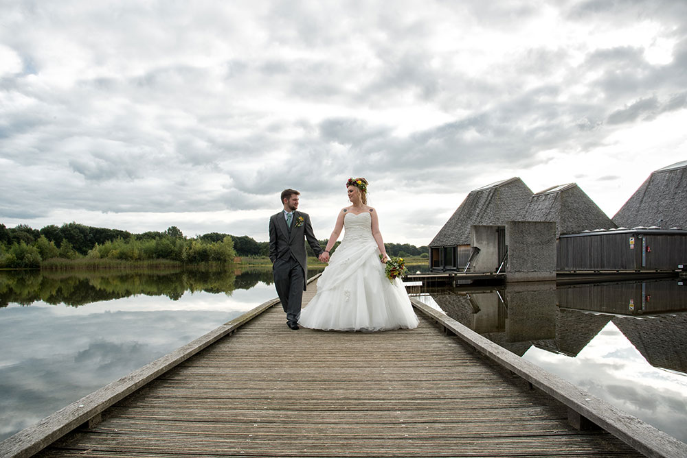 Couple walking on jetty