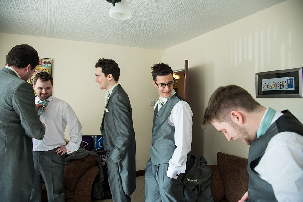 Groom and groomsmen getting ready