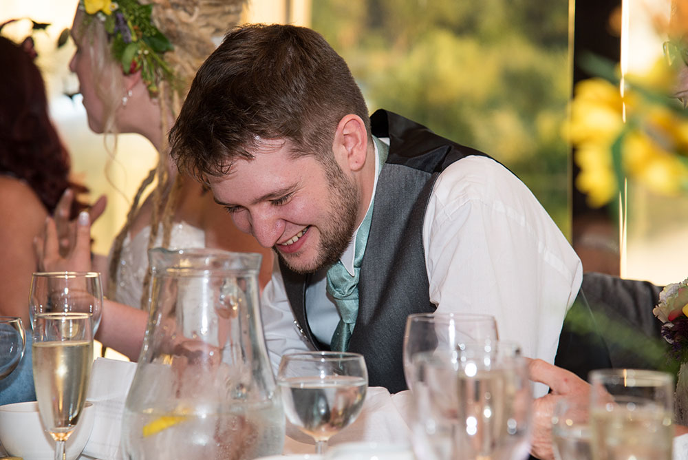 Groom reacting to speeches