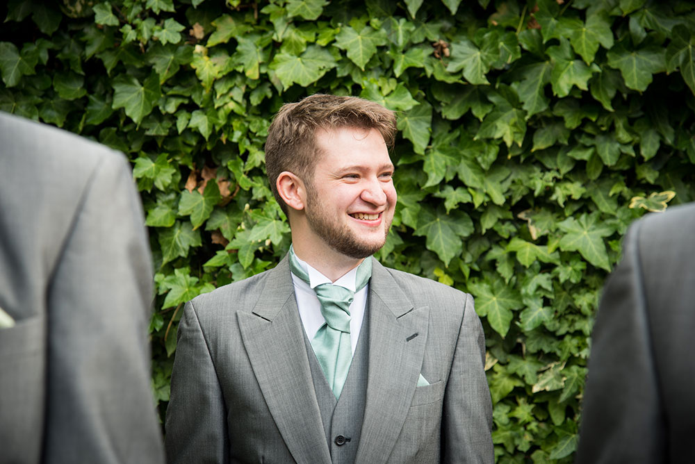 Groom smiling
