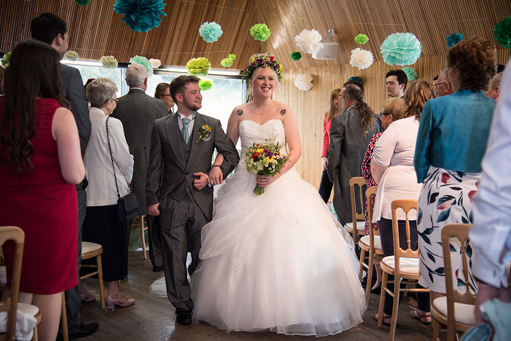 Couple leaving the ceremony room