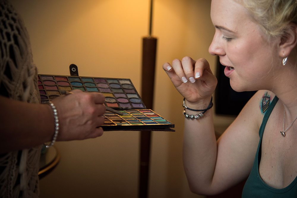 Bride selecting her make up