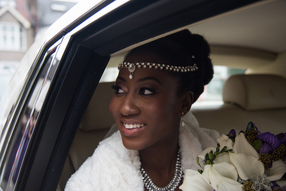 Bride looking out of car window