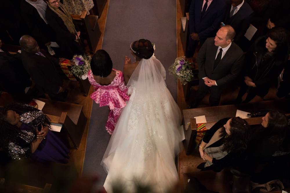 Shot of bride entering the church from above