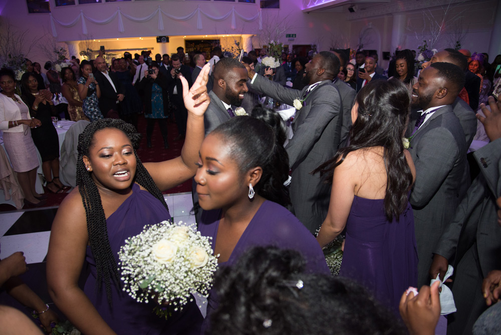 Wedding party dancing together