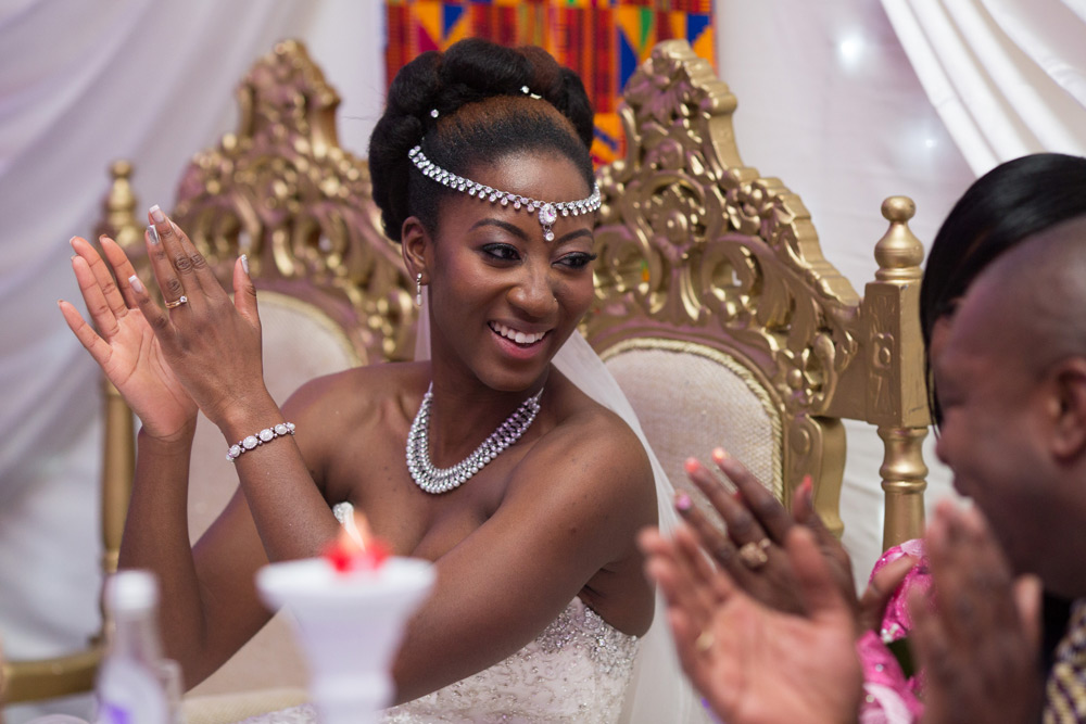 Bride clapping during groom&rsquo;s speech