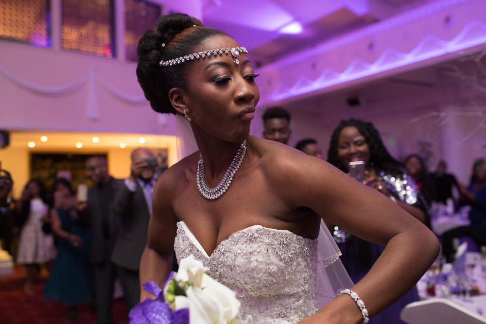 Bride&rsquo;s face while dancing into reception room