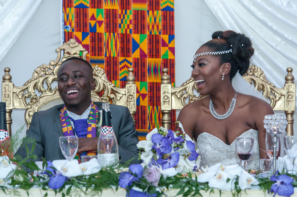 Bride and groom reacting to speeches
