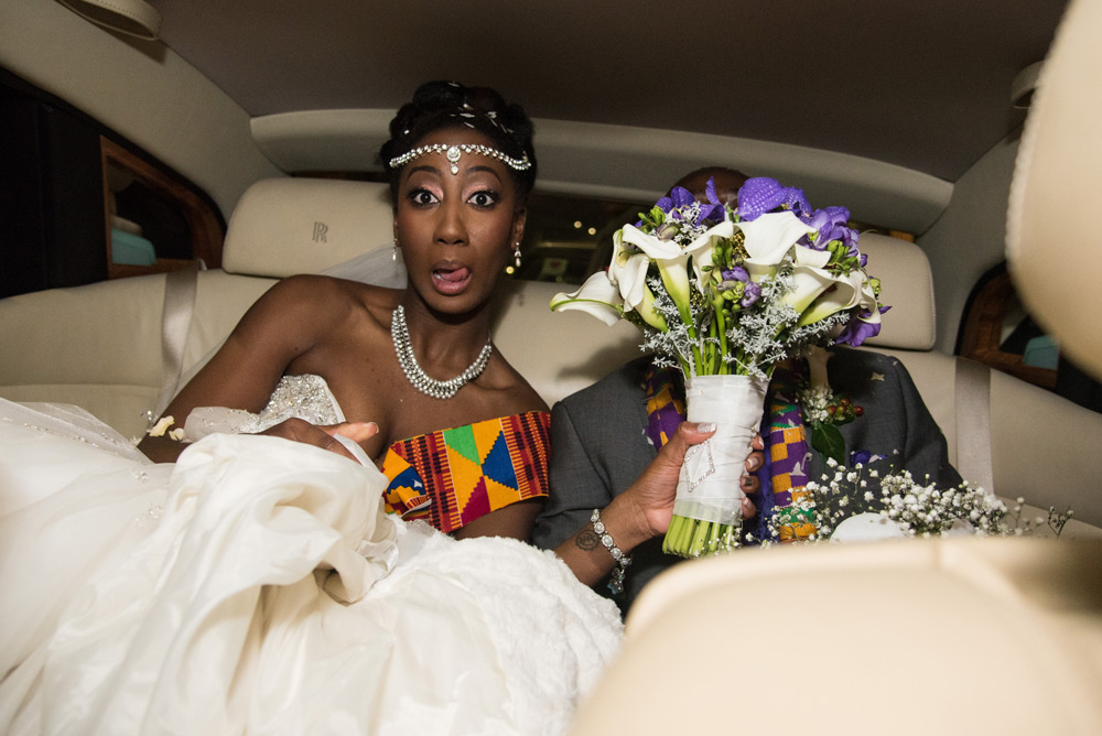 Bride hides groom&rsquo;s face with her bouquet