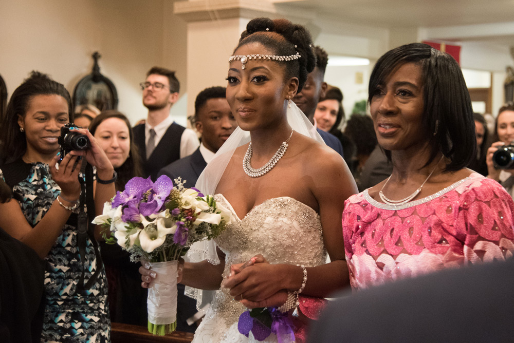 Bride and mother walking down the aisle