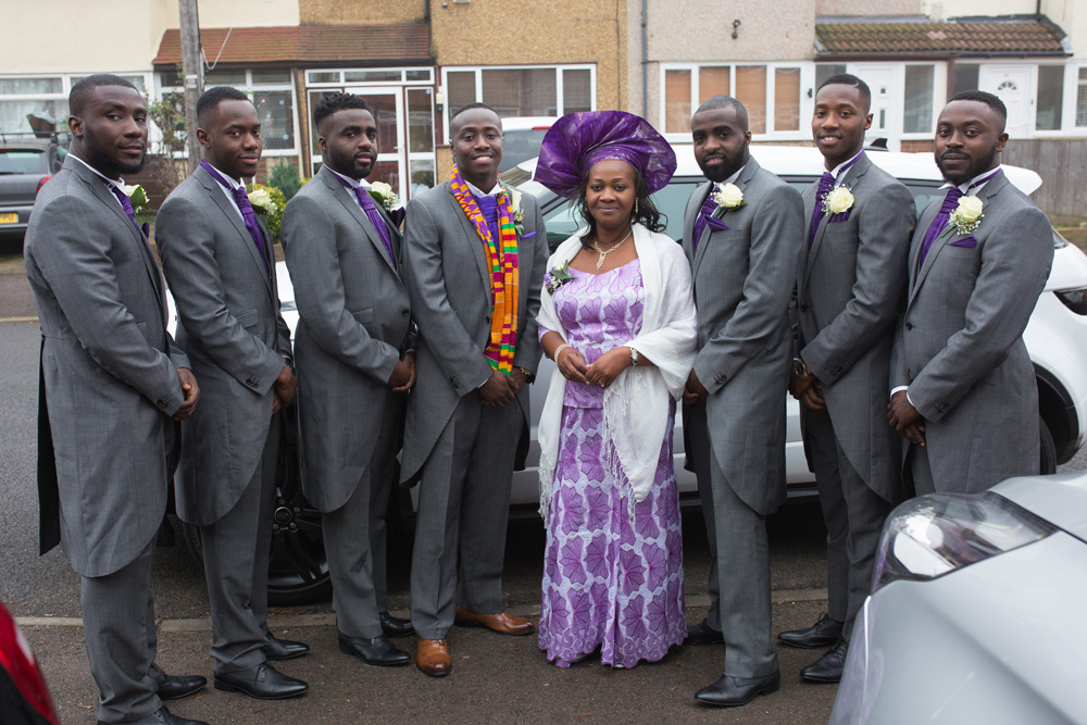 Groom&rsquo;s mum with wedding party