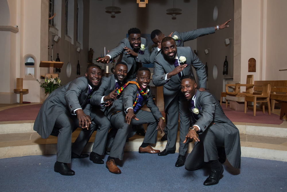 Groom and groomsmen posing