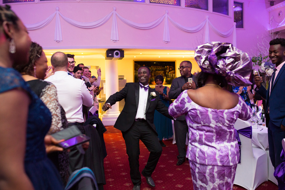 Groom&rsquo;s parents dancing