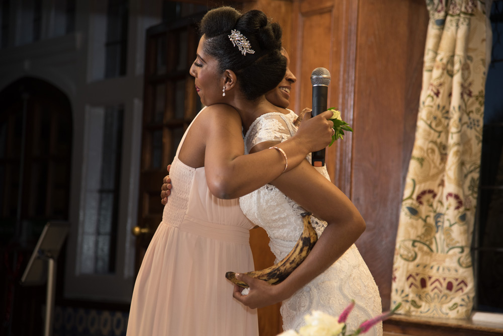 Bride hugging maid of honour