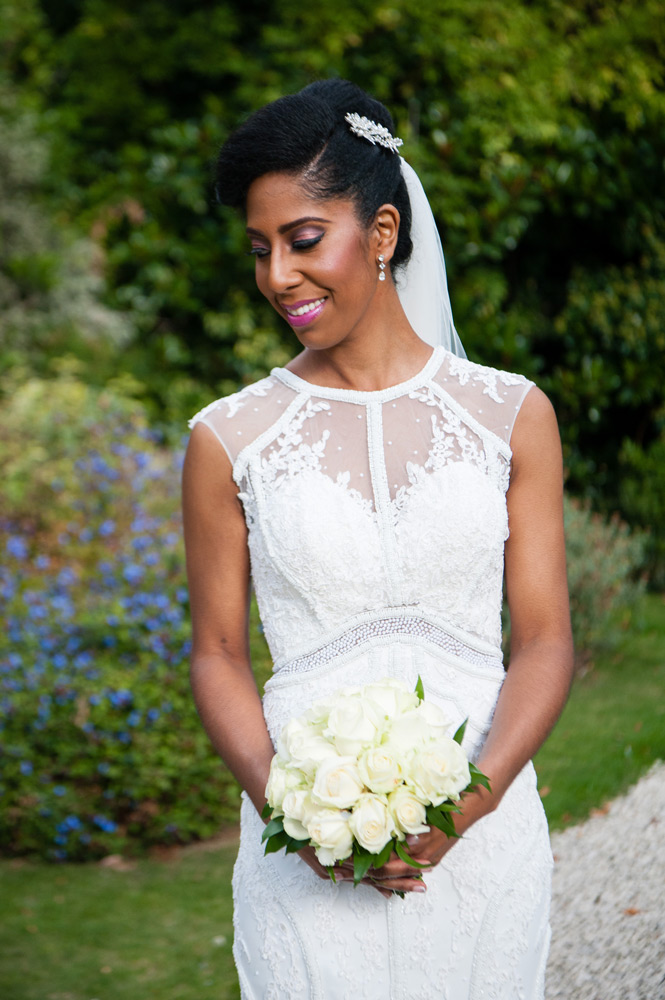 Bride posing in gardens at Charlton House