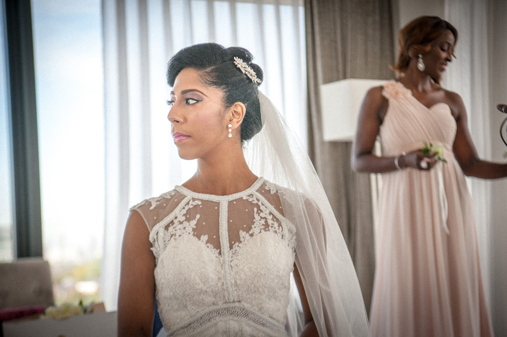 Bride taking a moment before leaving for the church