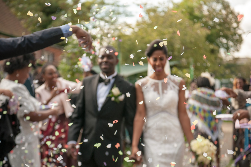Confettin in focus with couple out of focus