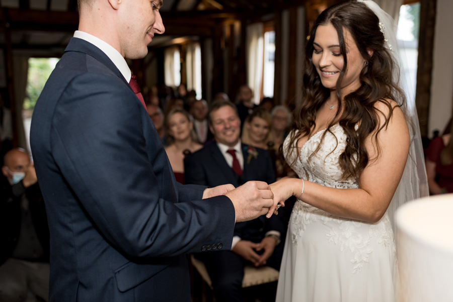 Couple exchanging rings