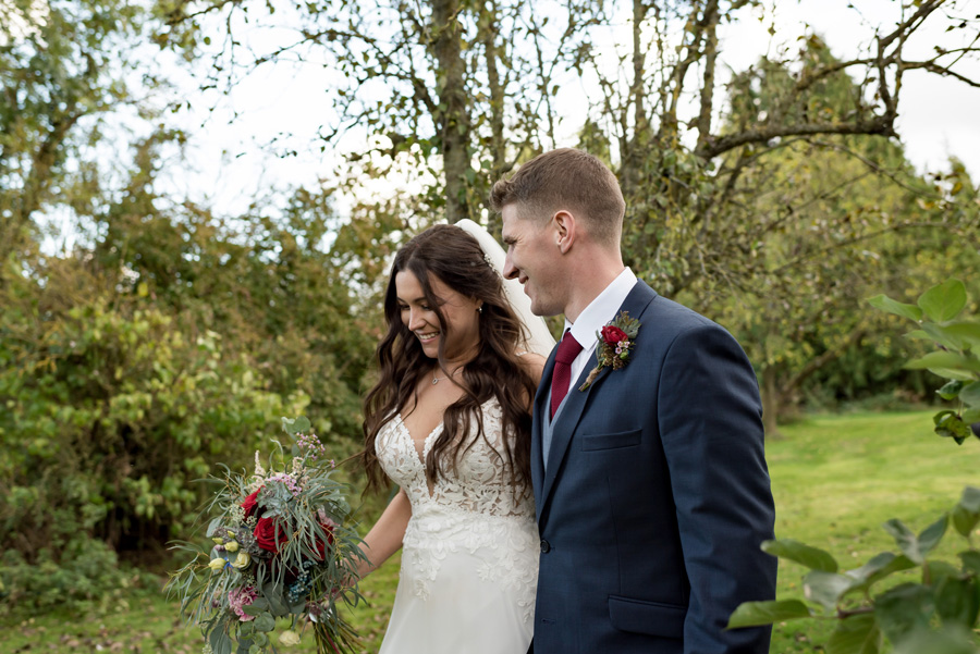 Couple walking after wedding ceremony
