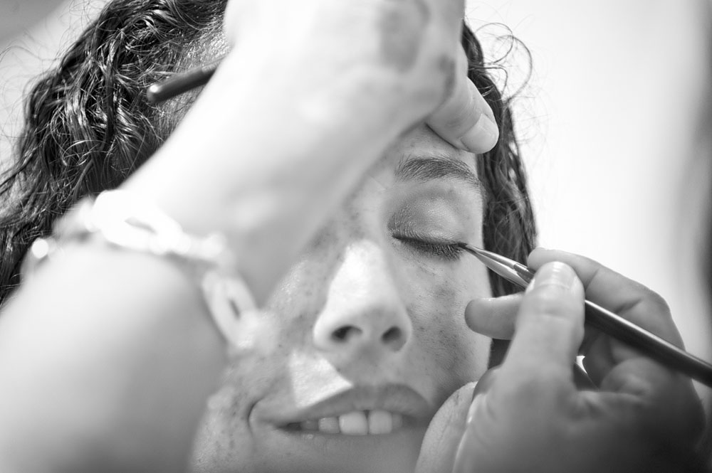 Bride getting make up done