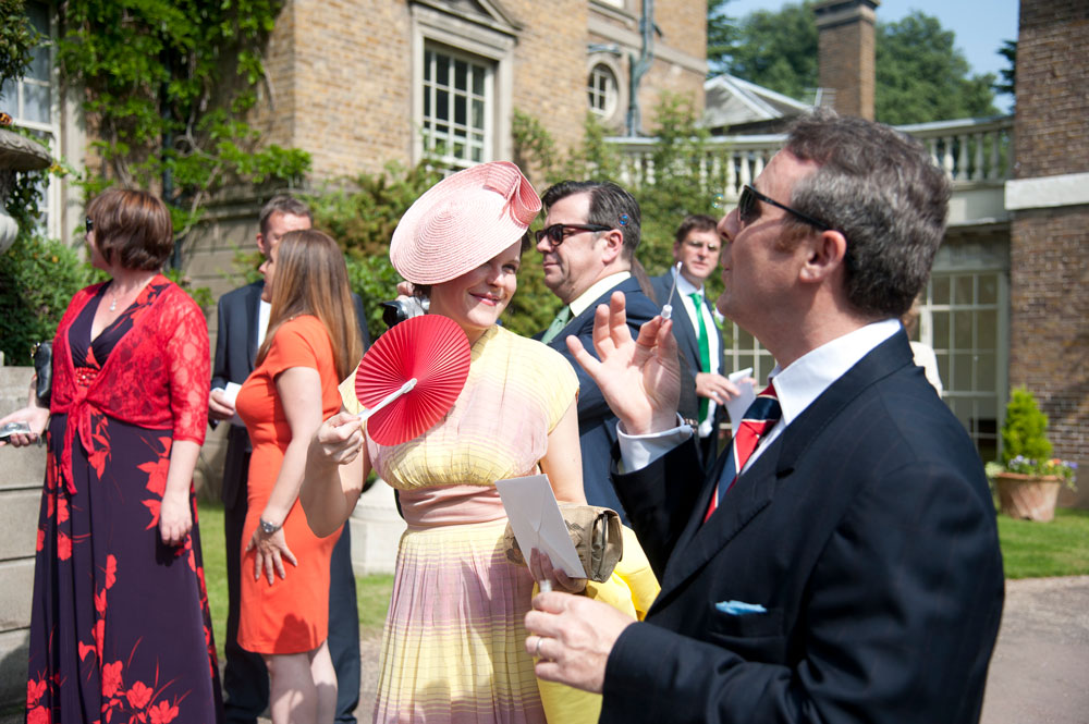 Guest fanning herself