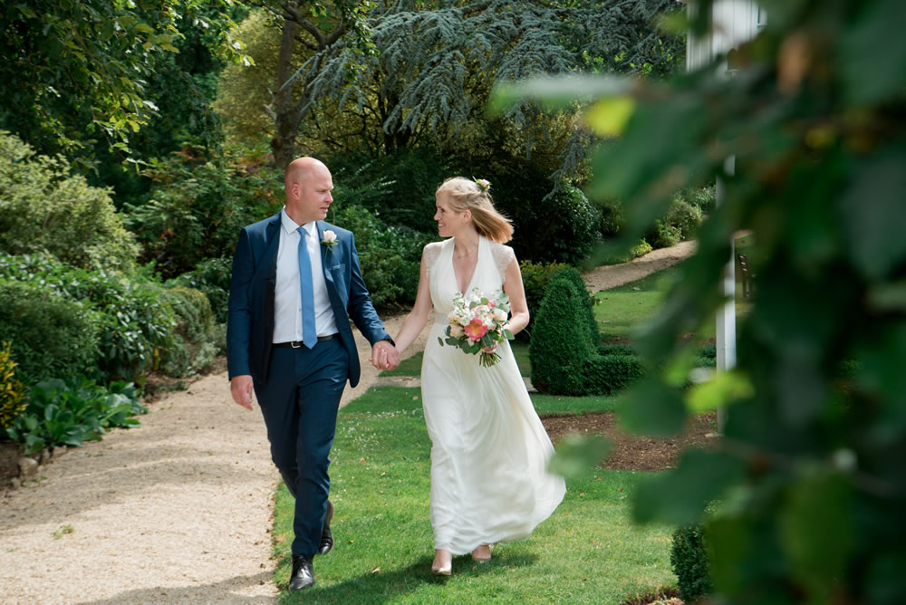 Couple walking through hotel grounds