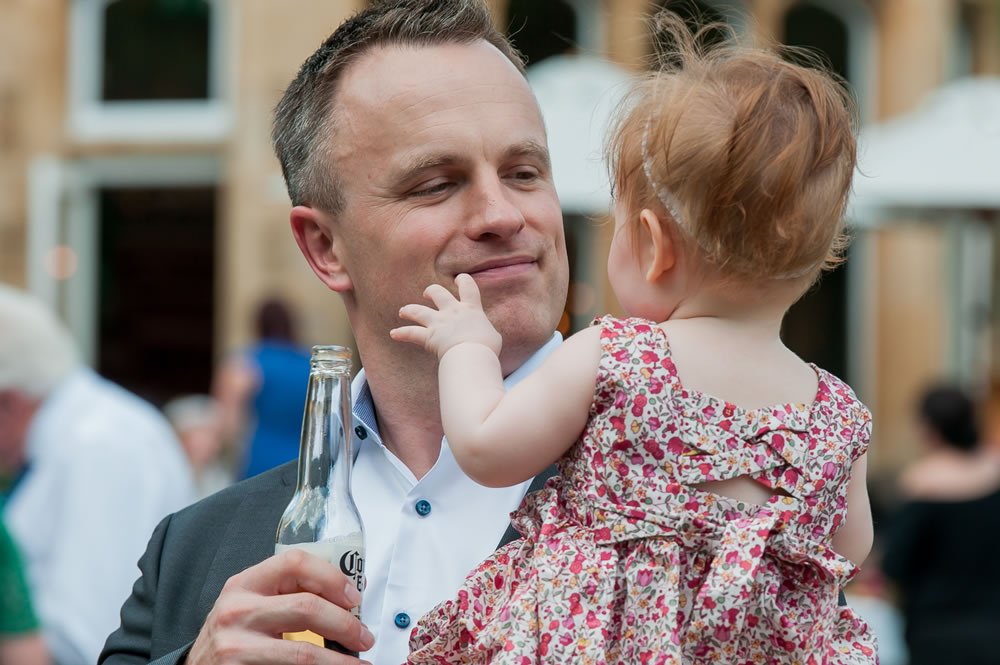 “Guest holding child