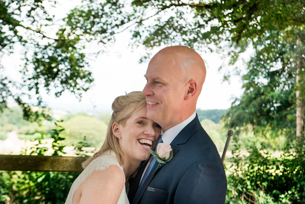 Bride and groom laughing together