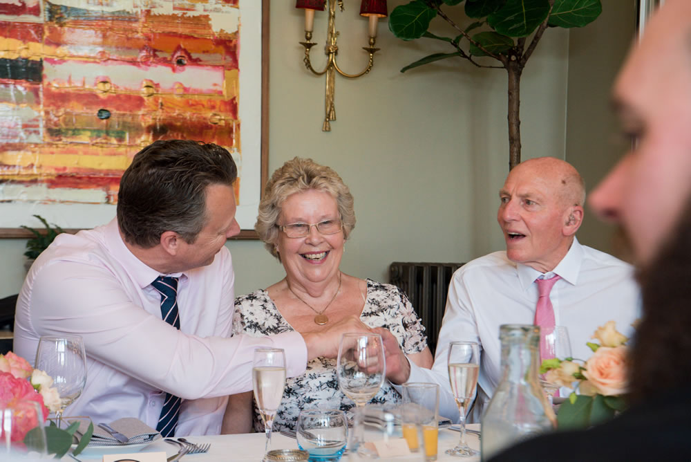 Guests laughing