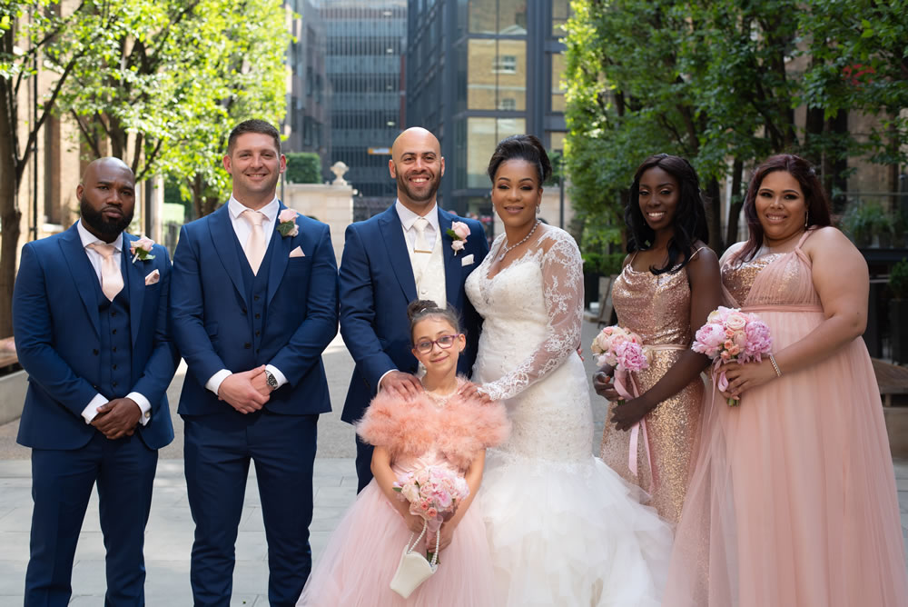Bridal party posing for the camera