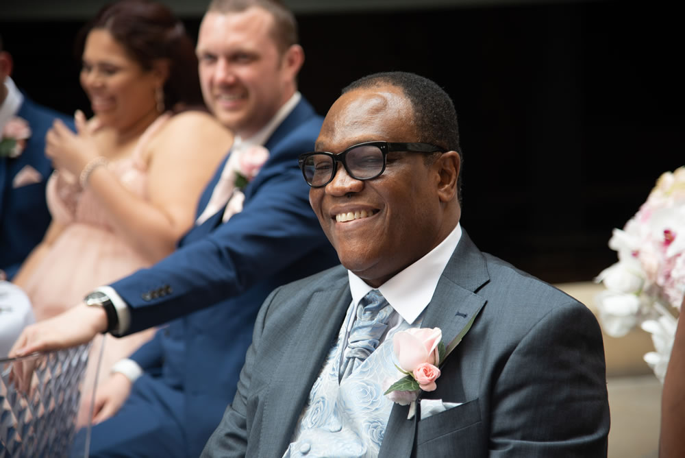 Father of the bride smiling