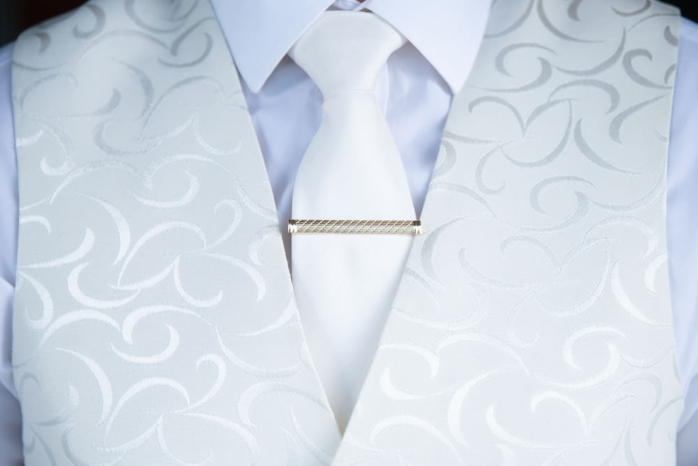 &ldquo;Close up of groom&rsquo;s waistcoat