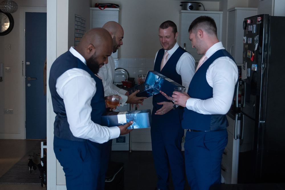 Groomsmen with their gifts