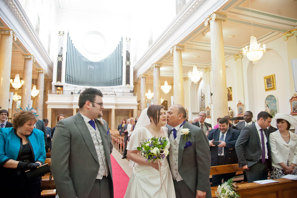 Bride arriving at altar with father