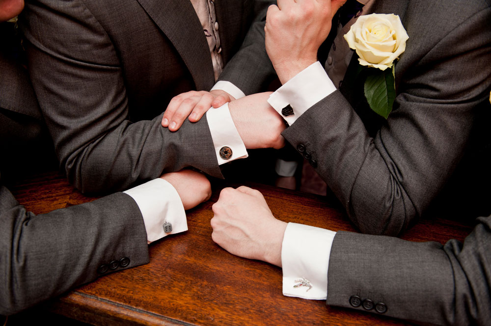 Cufflinks on groom and wedding party