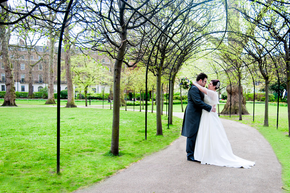 Couple hugging in park