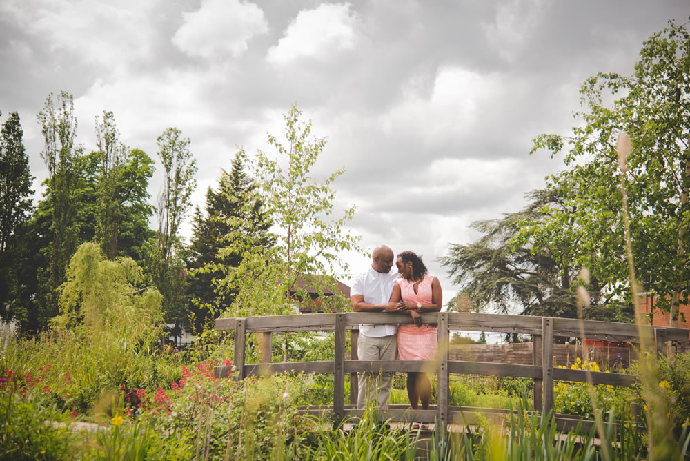 Couple stood on bridge