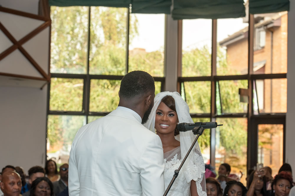 Couple looking at each other during service