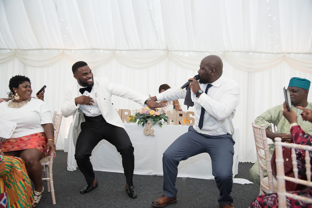 Groom dancing with MC
