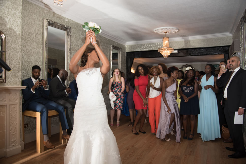 Bride tossing the bouquet
