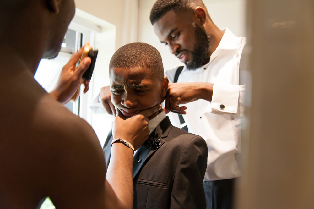 Getting young groomsman ready