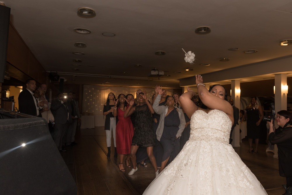 Bride tossing the bouquet